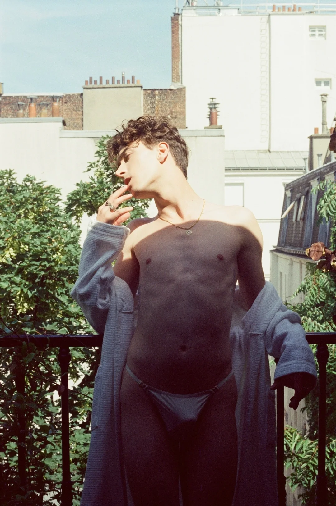 Jules Sauvage — open bathrobe on the Paris balcony, gay boyfriend experience Paris